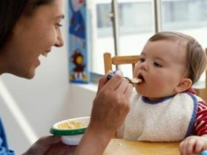 Mother feeding baby